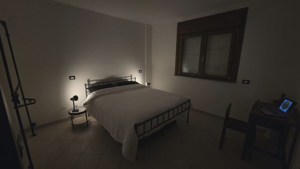 camera da letto alloggio fiumicino